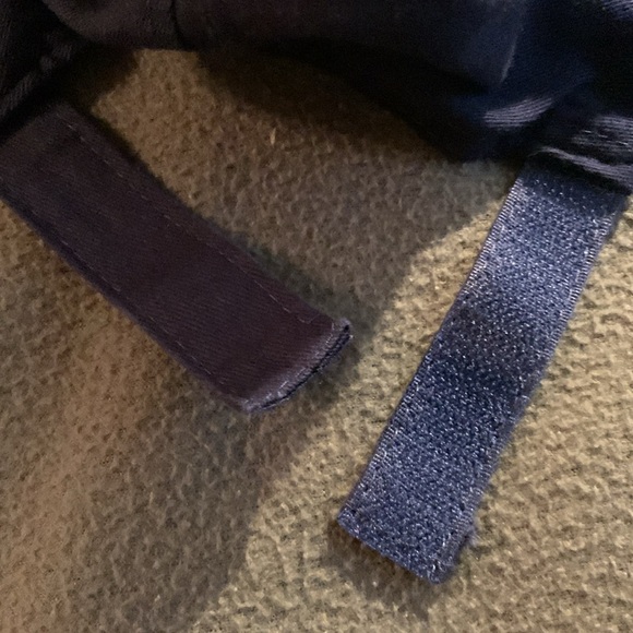 Navy hat w/ red embroidered USA.  Velcro strap in back. One size fits all - Picture 4 of 7